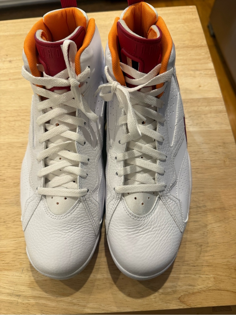 Jordan men’s ' White/Maroony Red Basketball Shoes with Orange Accents